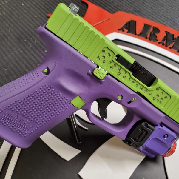 Custom pistol with purple and green finish