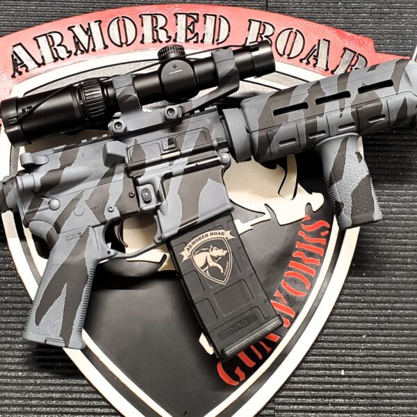 Gray camouflage AR-style rifle